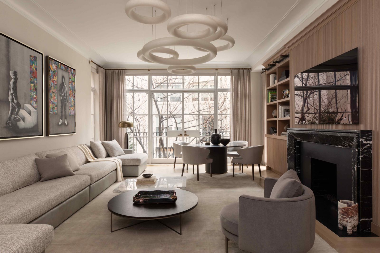 Norwegian artist Martin Whatson’s artworks add vibrancy to the neutral-toned family room