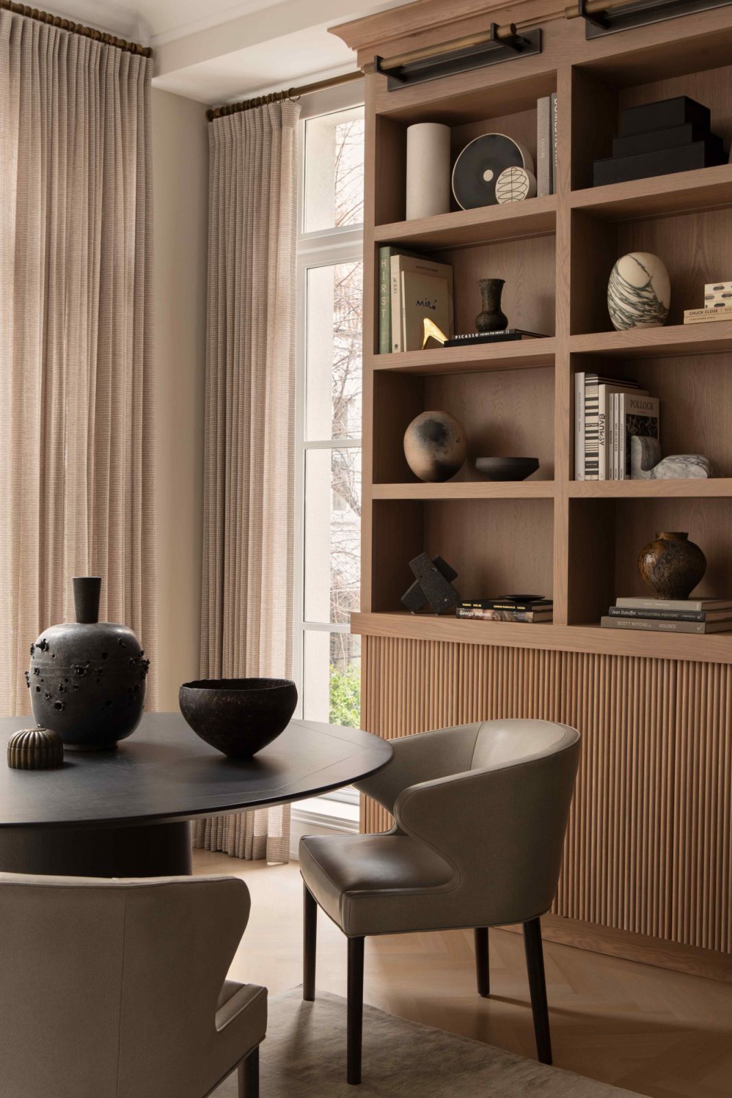 Oak built-ins filled with personal objects and paraphernalia
