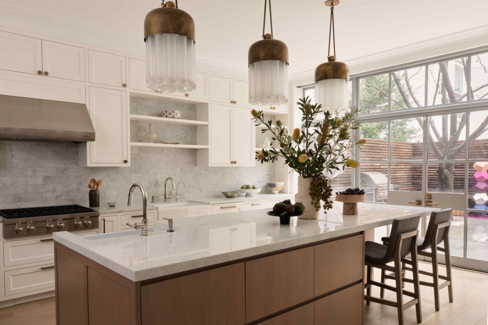 The kitchen feels sheltered and approachable for gatherings