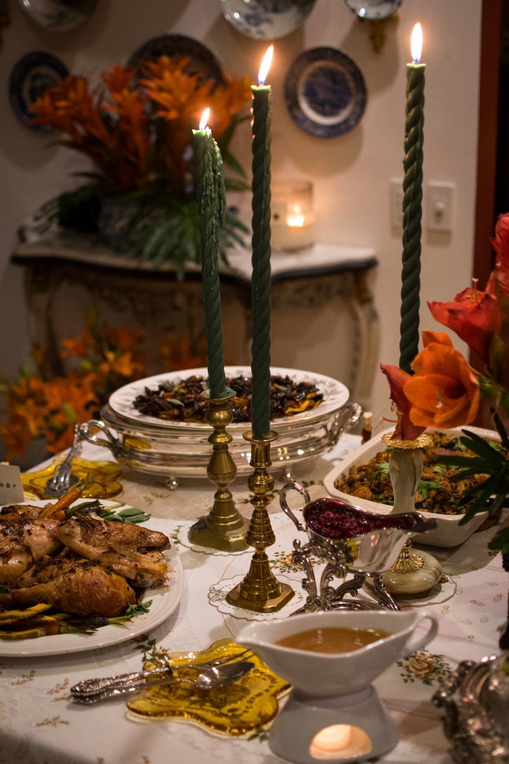 An exquisite buffet setup illuminated by candles for the holiday season