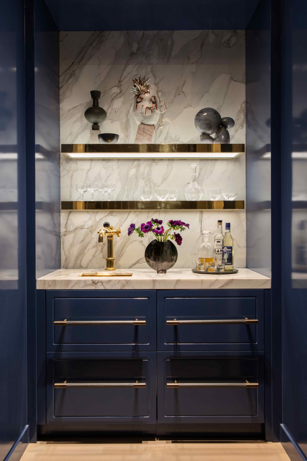 The homeowners’ love for deep blues highlight different parts of the home