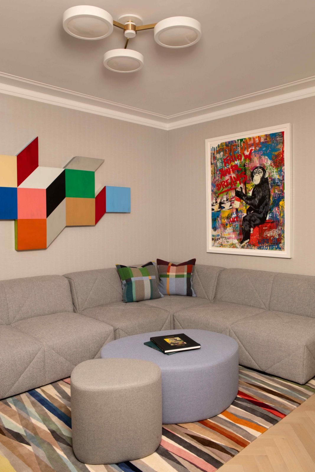 The neutral-hued walls serve as perfect backdrops to let the artworks shine