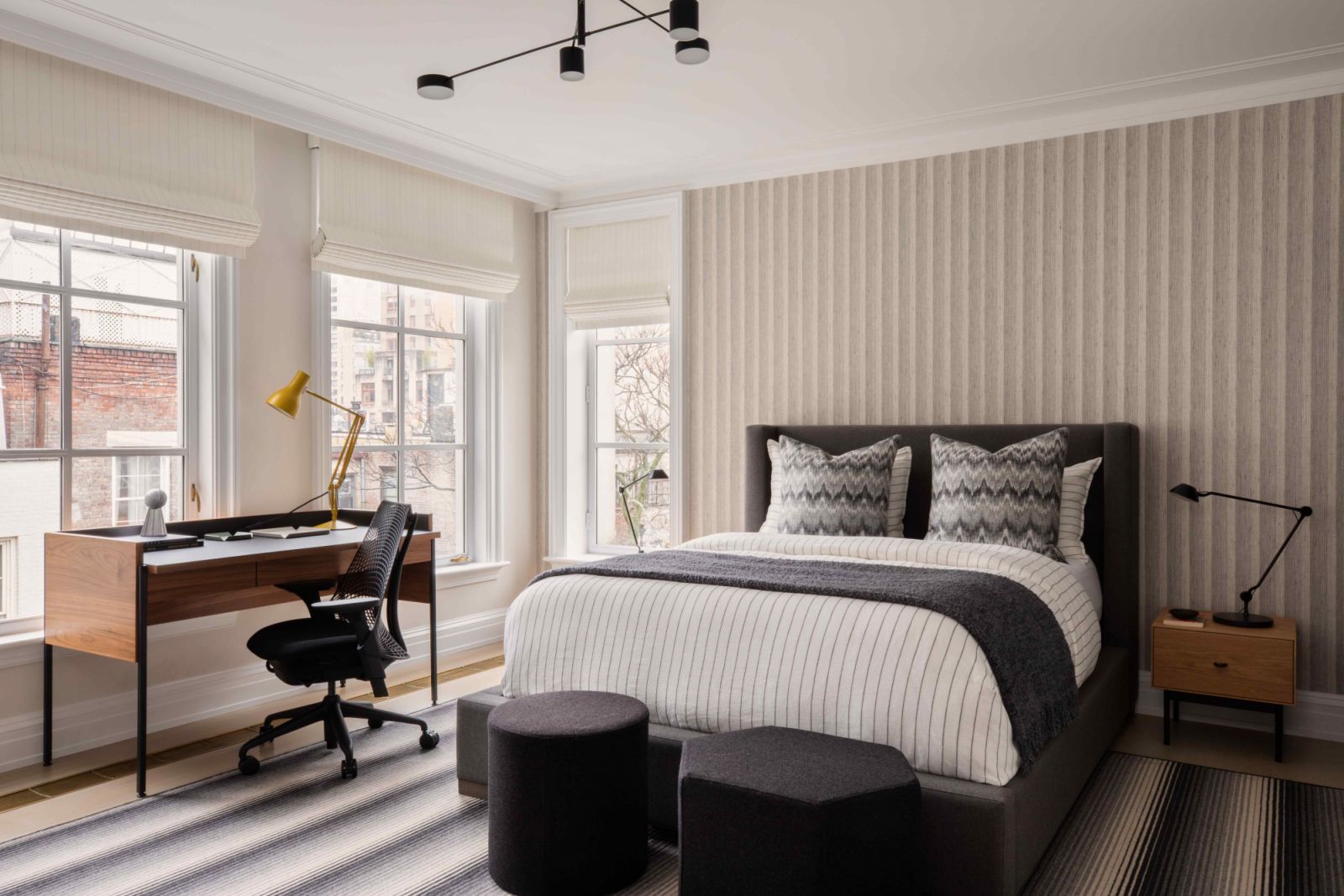 Broken whites, greys and soft beiges in one of the six bedrooms