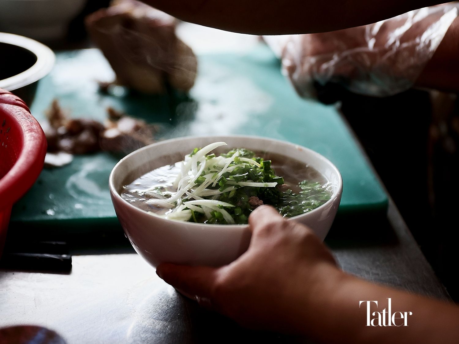 Ingredients such as rice noodles and beef are carefully selected and prepared.