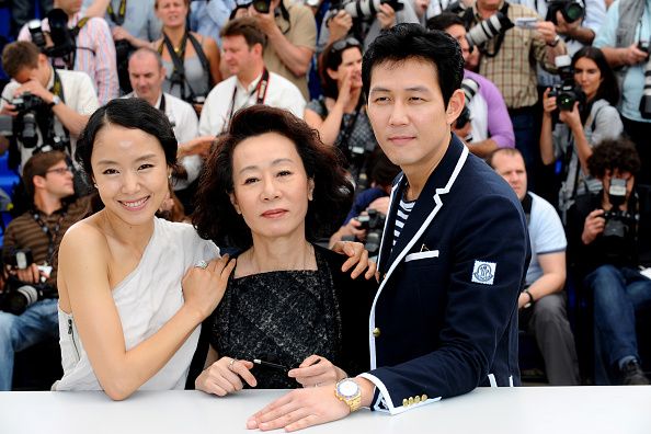 Lee Jung Jae, Youn Yuh Jung and Jeon Do-yeoun at the photocall for "The Housemaid" during the 63rd Cannes International Film Festival. (Photo by Stephane Cardinale/Corbis via Getty Images)
