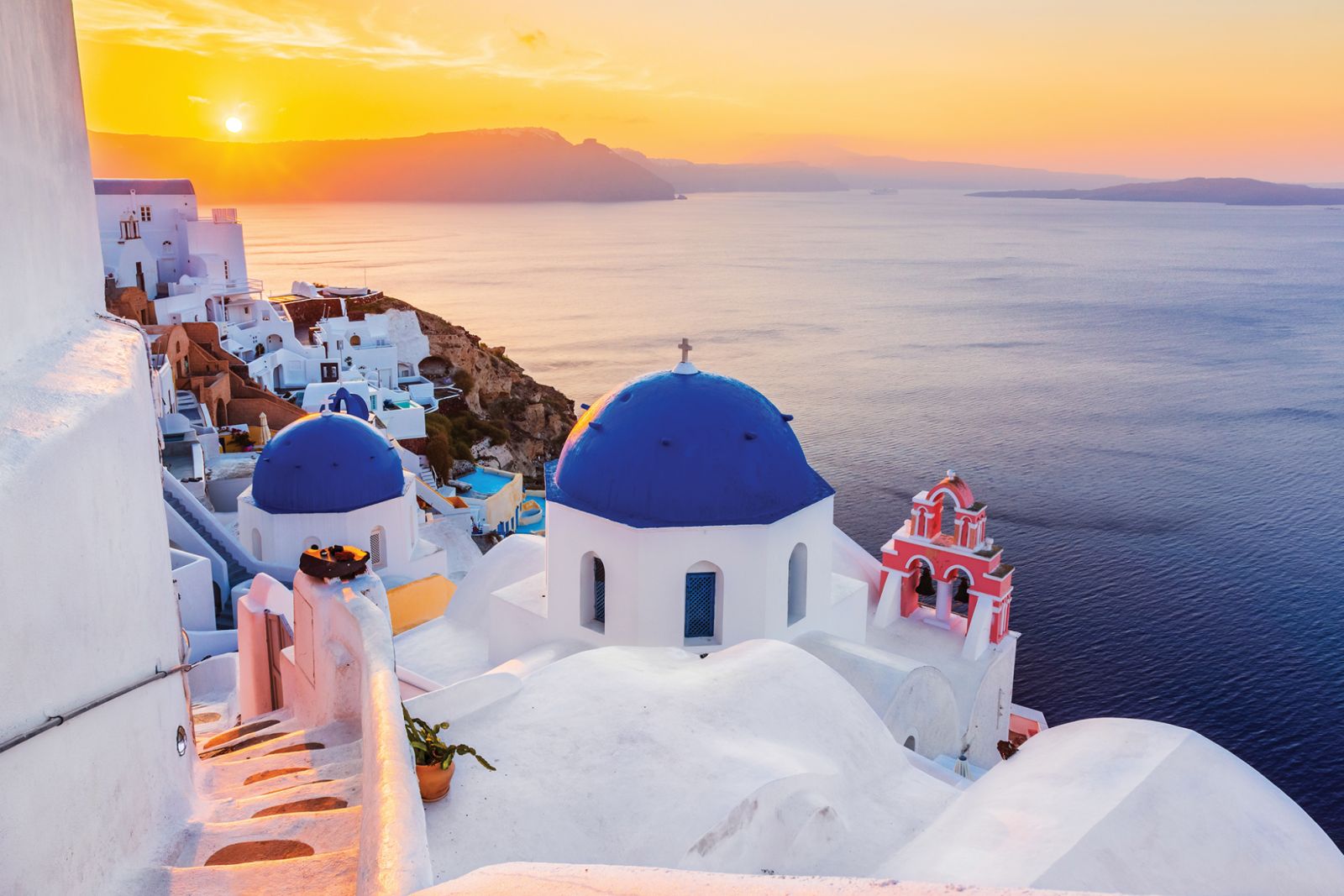 Santorini, Greece. The picturesque Oia village at sunrise.
