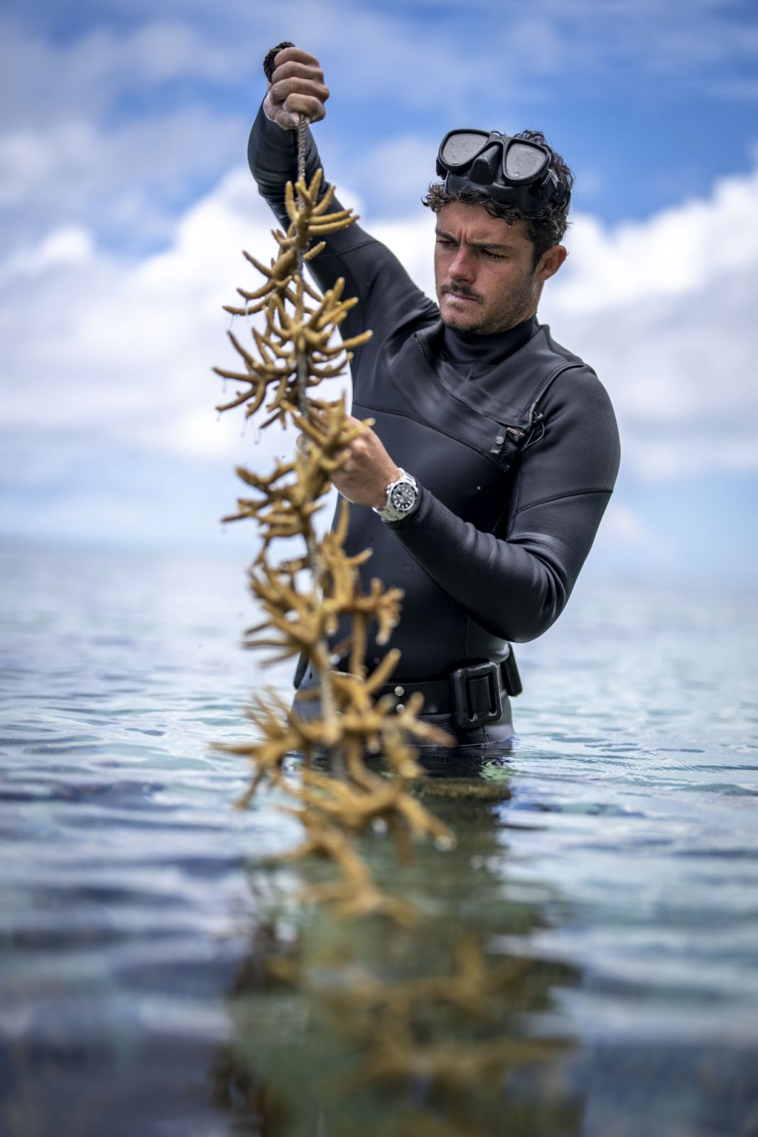 Titouan Bernicot, Founder and CEO of Coral Gardeners, checks the coral at a nursery site in Mo'orea, French Polynesia.