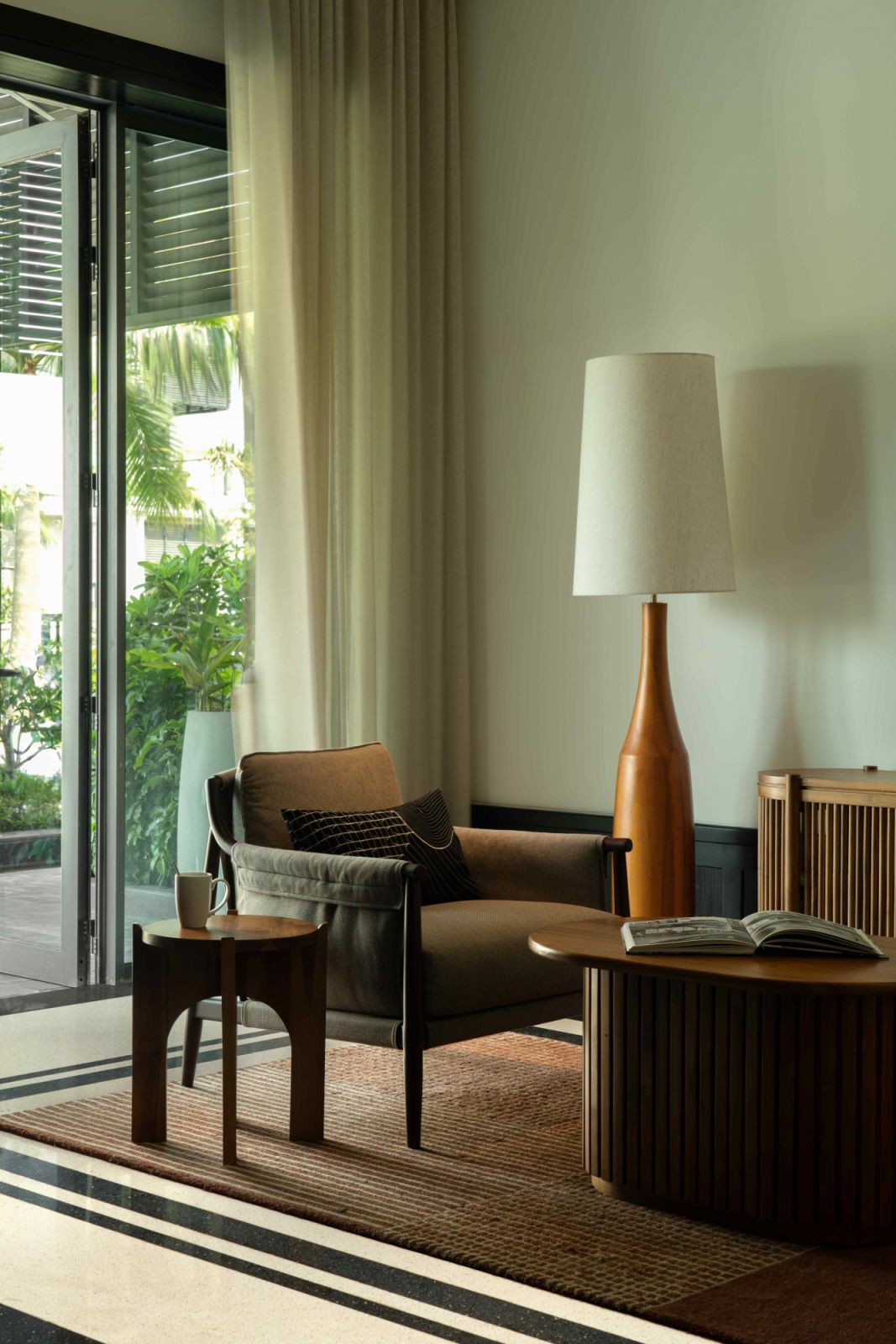 Complementing black-stained teakwood furniture and regional Kantha embroidery (Photo: Avesh Gaur)