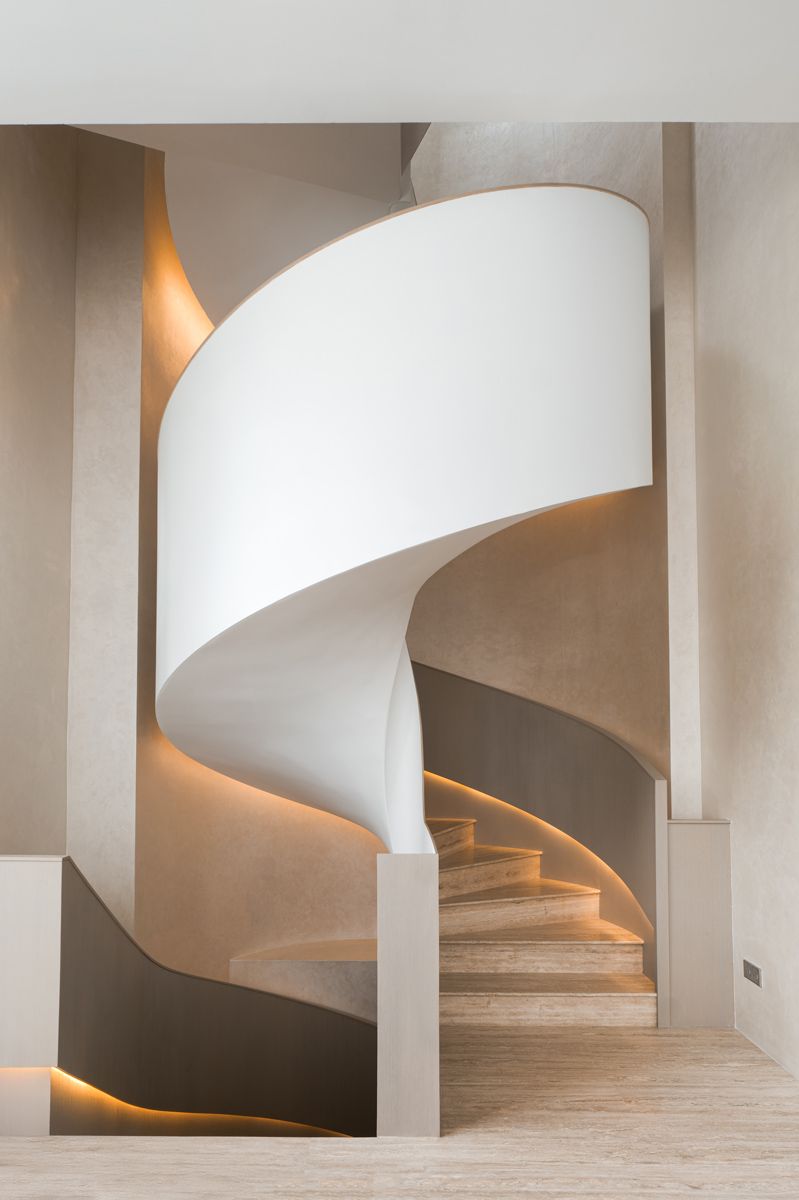 Articulated for residential scale, this staircase was inspired by Foster + Partner's Singapore Apple store