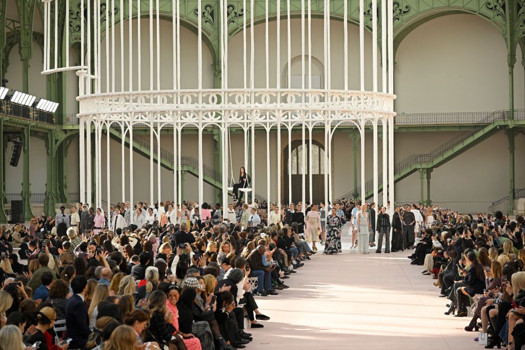 PARIS, FRANCE - OCTOBER 01: (EDITORIAL USE ONLY - For Non-Editorial use please seek approval from Fashion House) Models pose on the runway as Riley Keough performs during the Chanel Paris Womenswear Spring-Summer 2025 show as part of Paris Fashion Week on October 01, 2024 in Paris, France. (Photo by Kristy Sparow/WireImage)