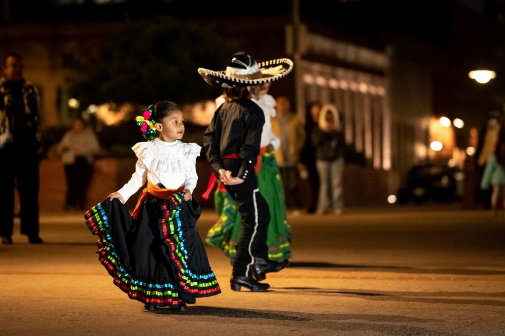 Los Angeles, CA - December 22:Traditional dance warms up the night at Olvera Street in Los Angeles Thursday, December 22, 2022. The dancers are part of the Las Posadas nightly procession from Dec. 16-23 which includes statues of Mary and Joseph being carried making stops at businesses along the street. (Photo by David Crane/MediaNews Group/Los Angeles Daily News via Getty Images)