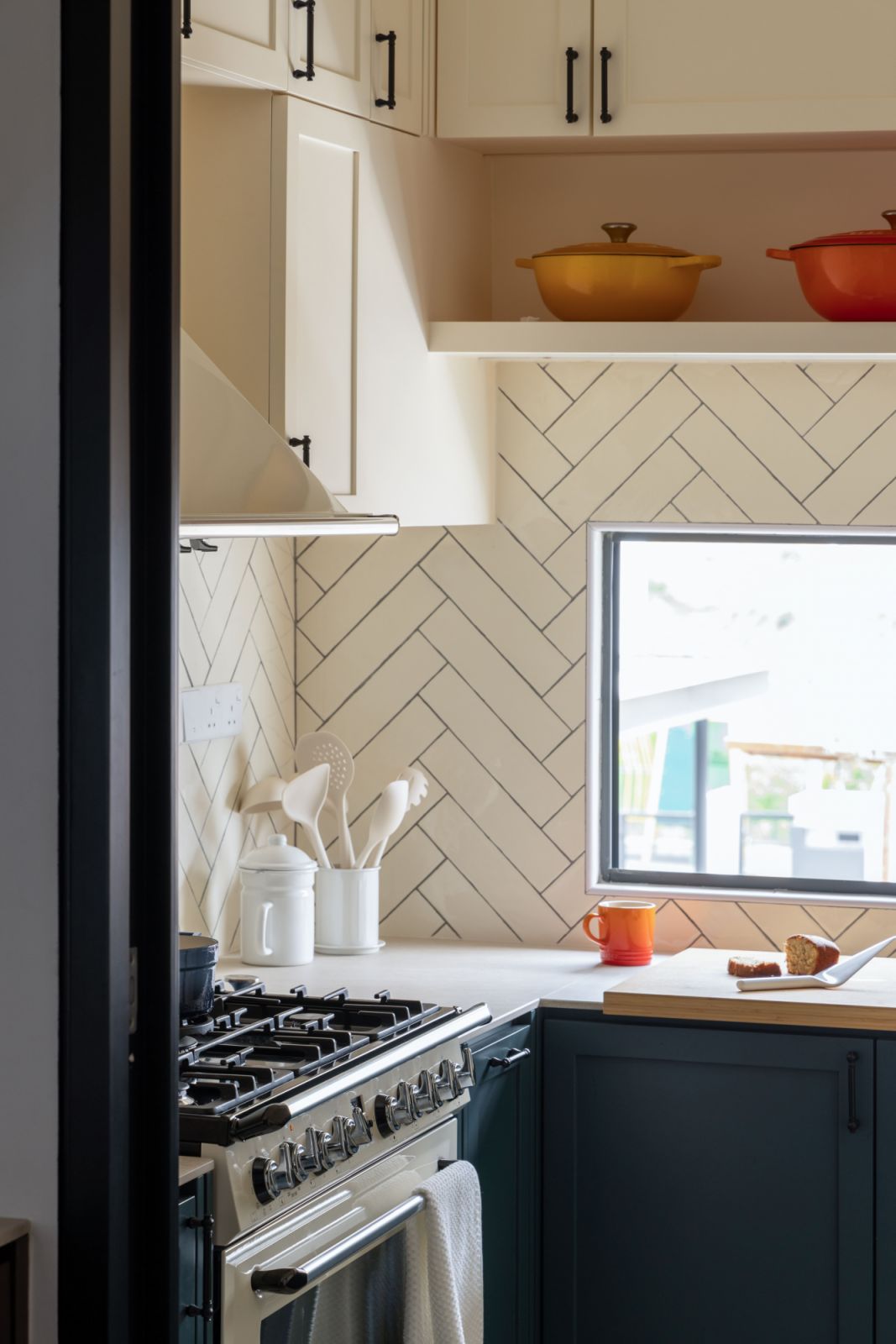 Herring bone tiles add interest in the kitchen
