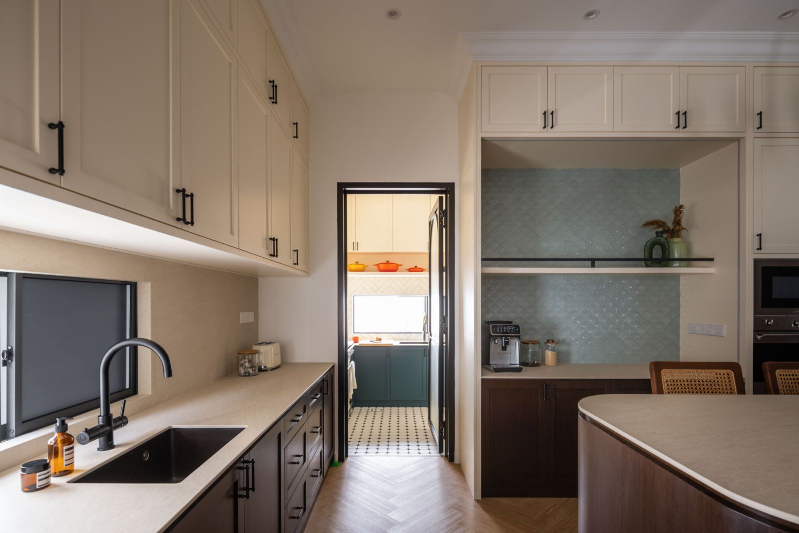 The open-plan dry kitchen blends luxury with functionality