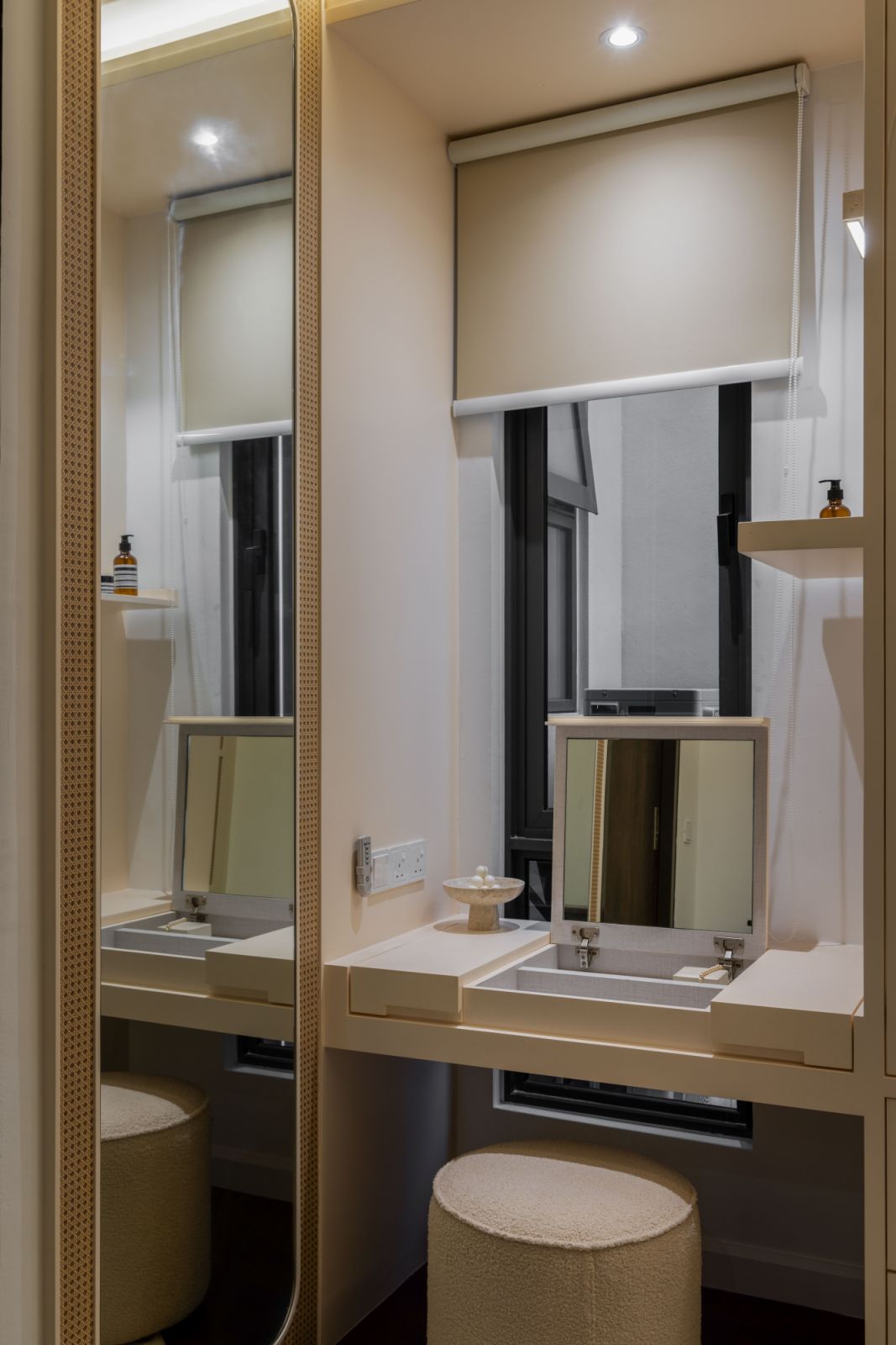 LED-lit rattan-paneled wardrobe doors in the walk-in