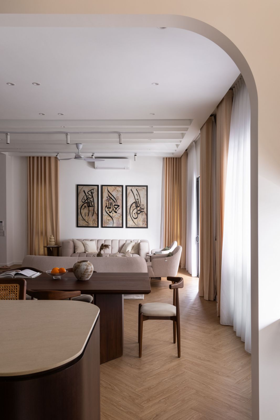 An arched opening frames the living space