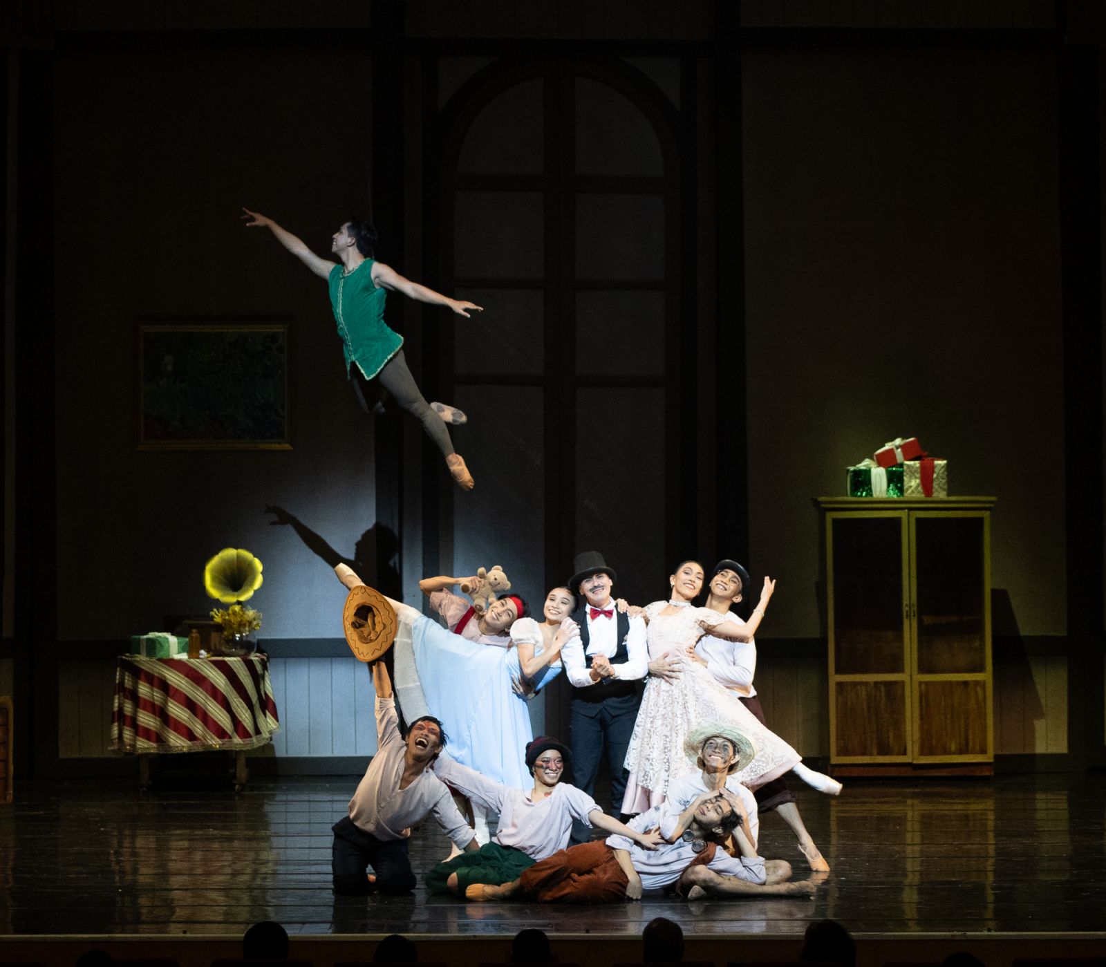 Peter Pan, the Darling family, and the Lost Boys come together in a heartwarming moment of unity