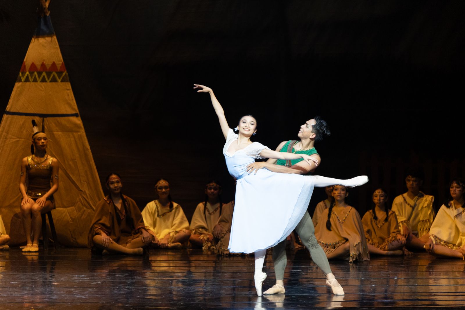Peter Pan and Wendy share a graceful moment together on stage