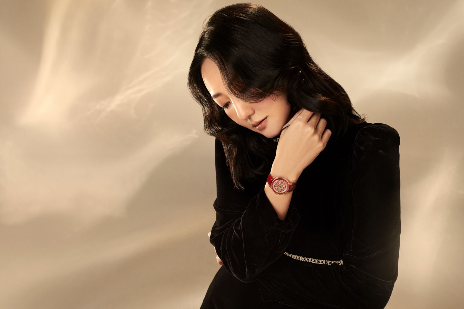 Outfit: Sandro; Watch: Franck Muller Round Skeleton Baguette 31 in 18k rose gold with rubies