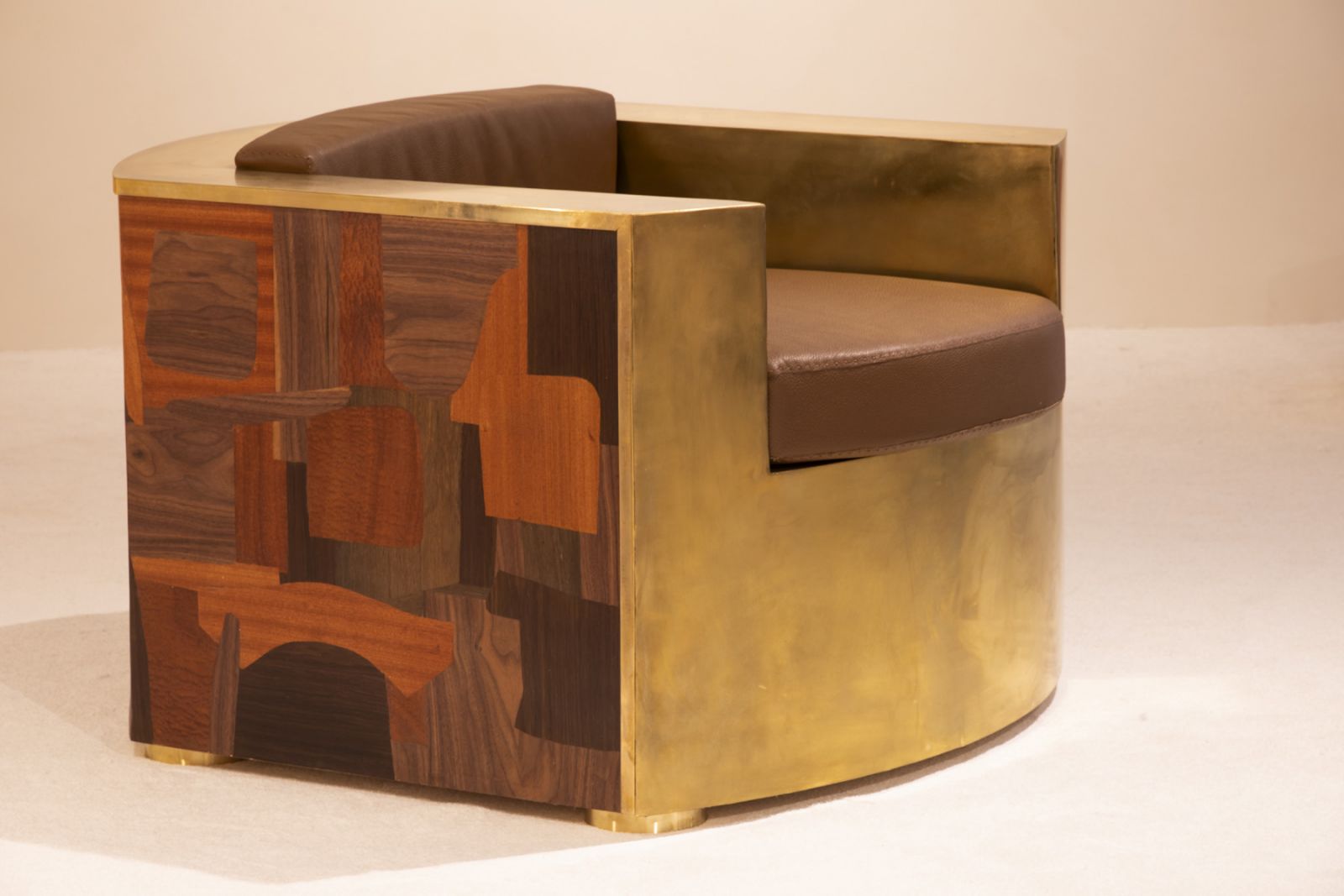 The Fendi Patchwork Club Chair in gold, polished brass and dark timber