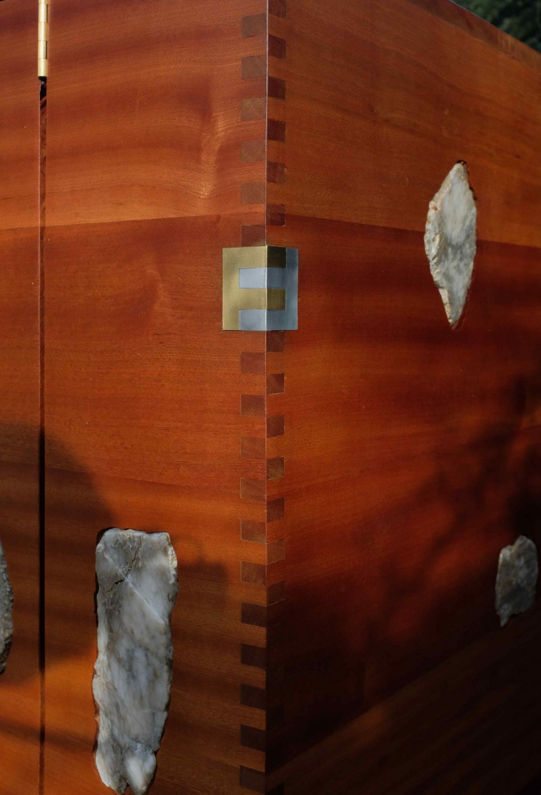 The FF logo motif incorporated in pieces of brass and aluminium