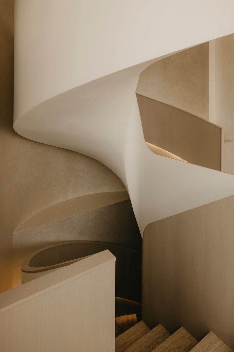 Fabricated by HG Group, this sculptural staircase drew inspiration from the Singapore Apple store