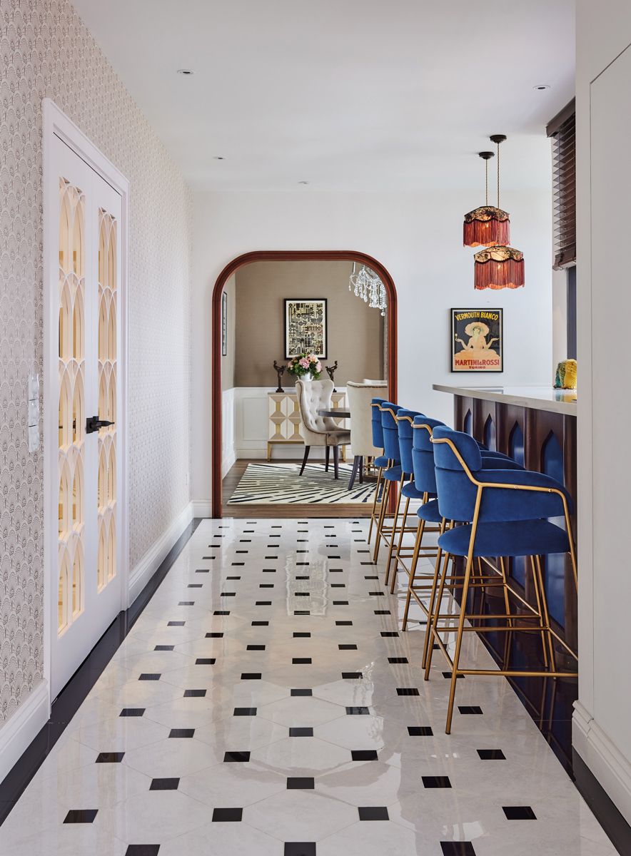 Archways and doors provide tantalising glimpses into the apartment's well-appointed interiors