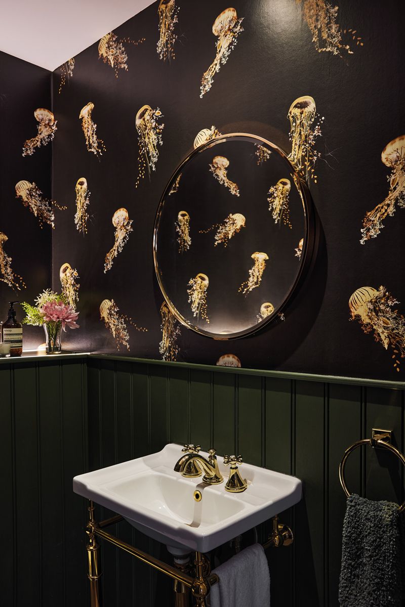 The striking marine-themed powder room is a sight to behold