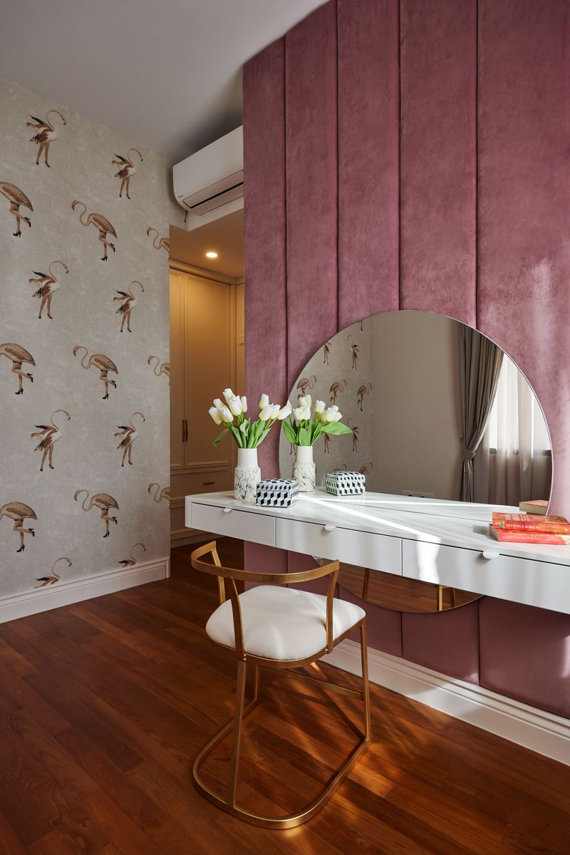 The vanity is elegantly articulated with plush textures and floral elements