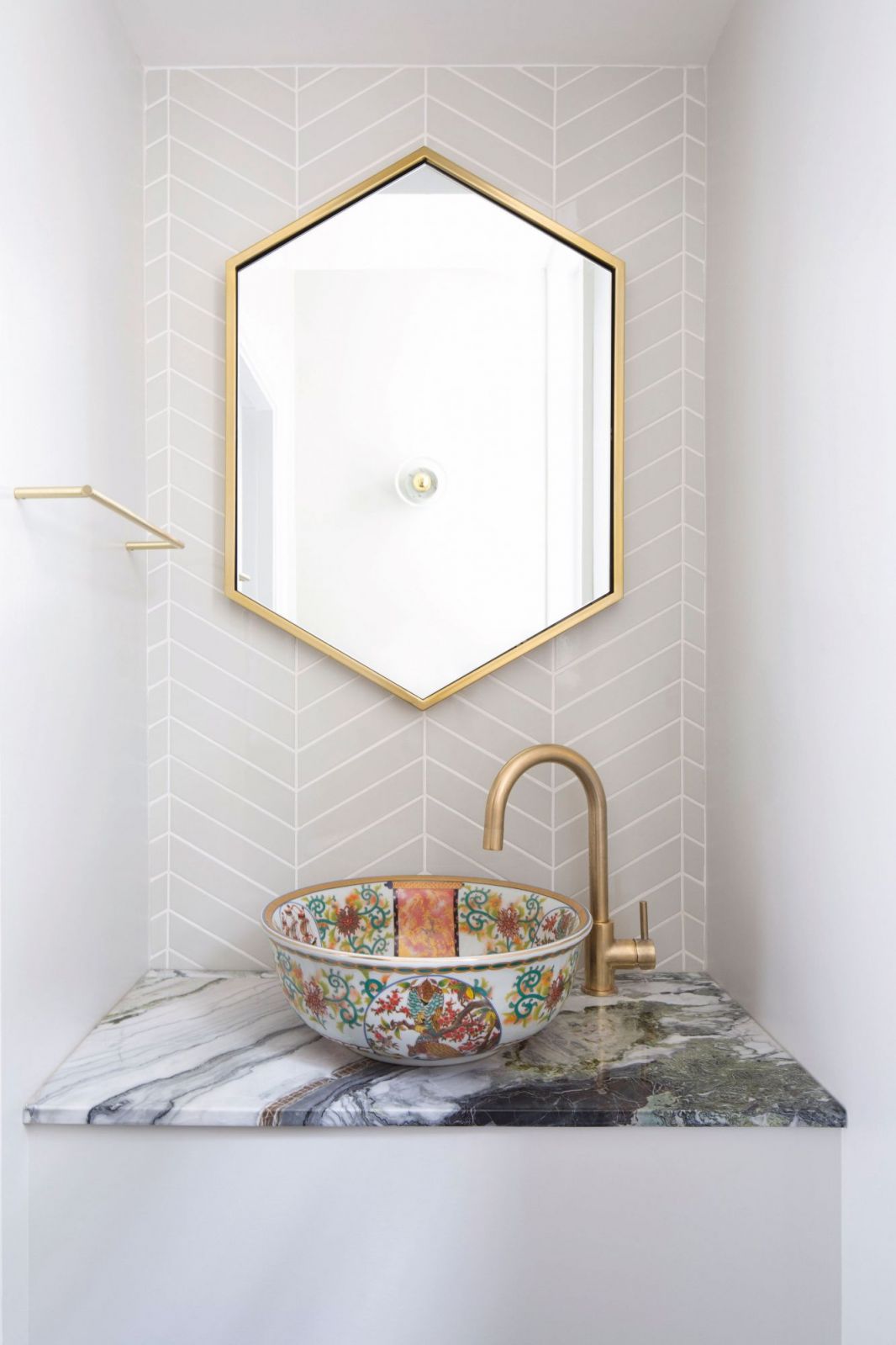 The bathroom basin combines Chinese patterns with contemporary floral motifs (Photo: Nicholas Worley)