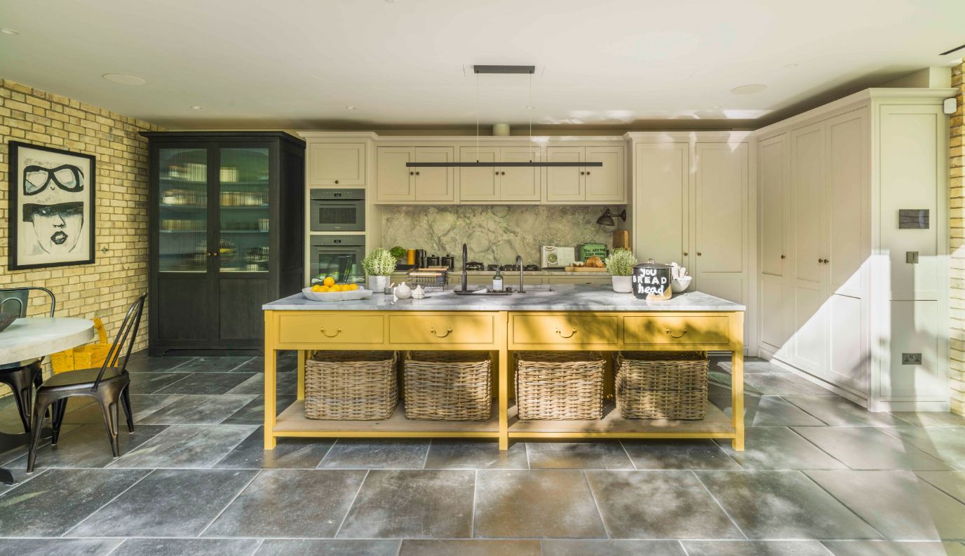 Bright yellow cabinetry in the kitchen (Photo: Mel Yates)