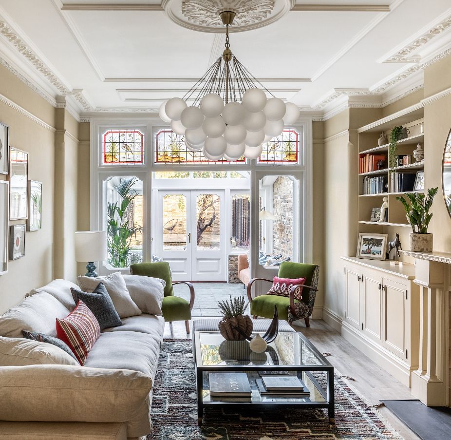 Decorative mouldings and stained glass windows in the living area (Photo: Taran Wilkhu)