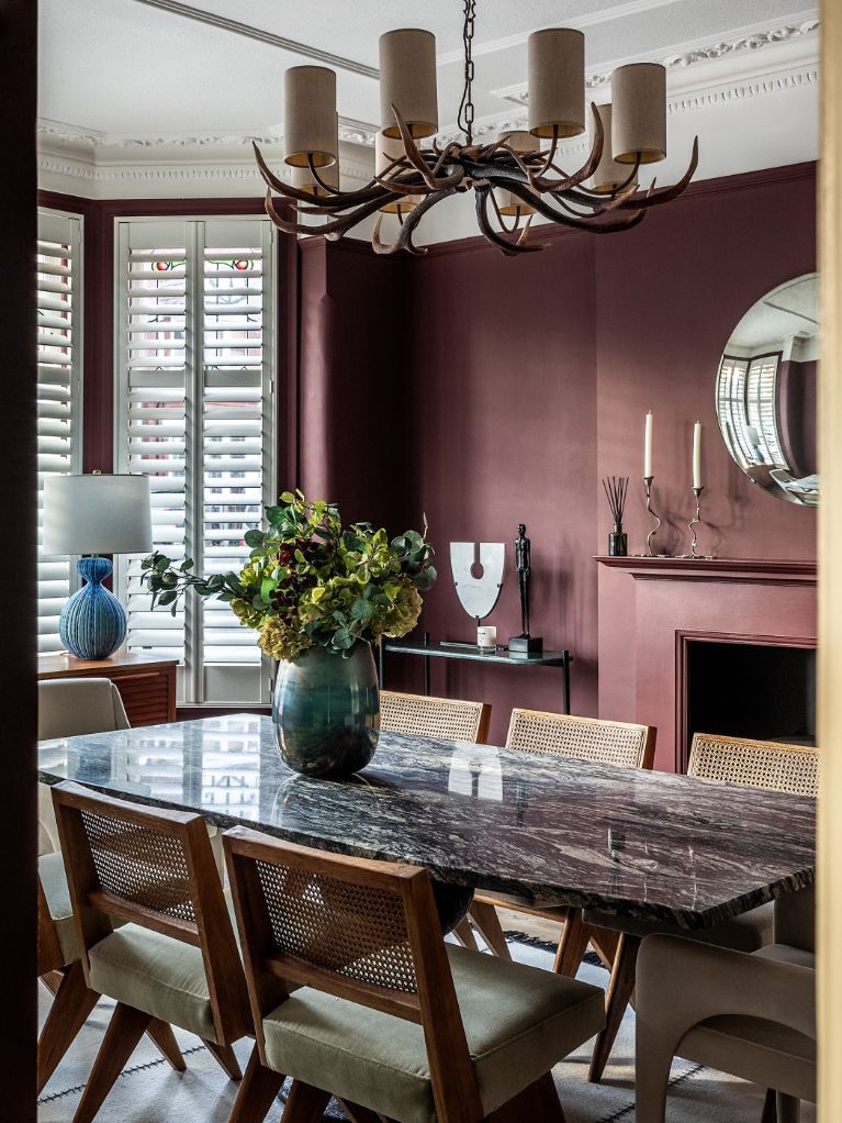 The burgundy red dining room (Photo: Taran Wilkhu)