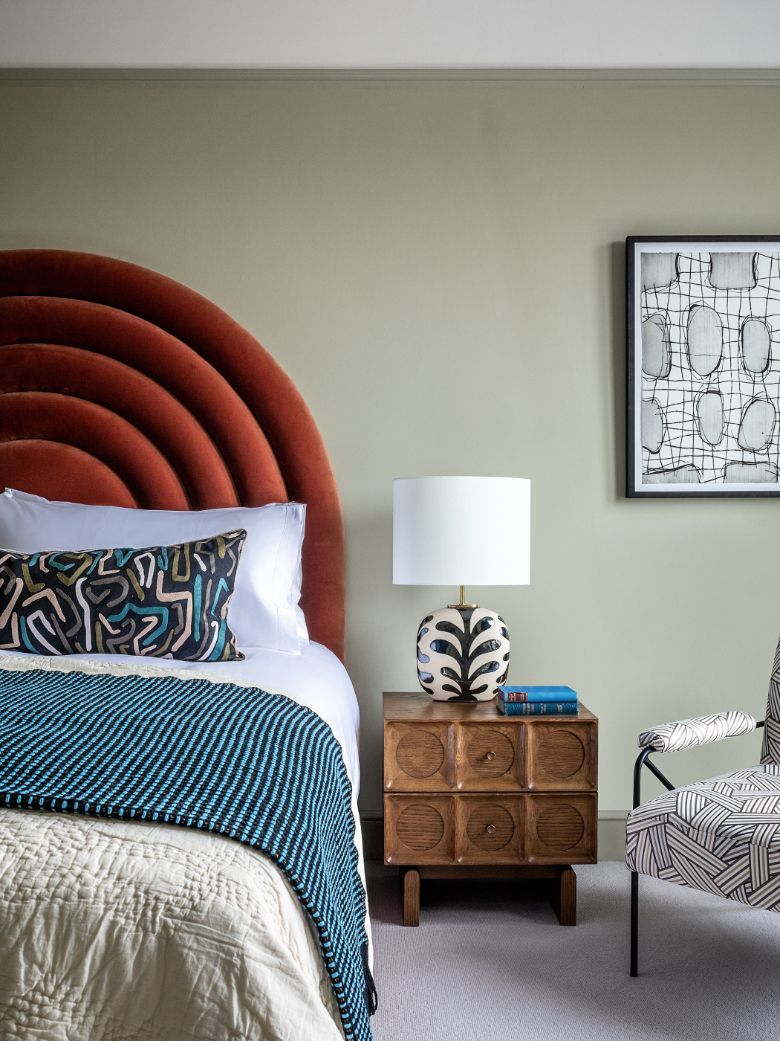 A fun, rainbow-shaped headboard in the bedroom (Photo: Taran Wilkhu)