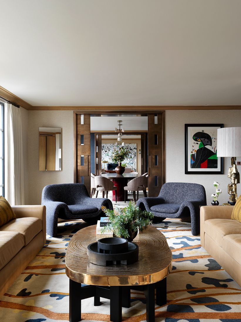 Paris-sourced armchairs reupholstered in textured blue fabric (Photo: Simon Brown)
