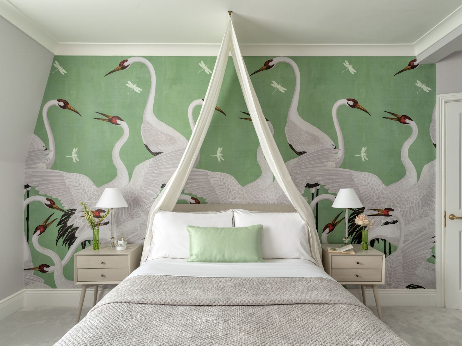 A majestic green and white wallpaper in one of the bedrooms (Photo: Richard Gooding)