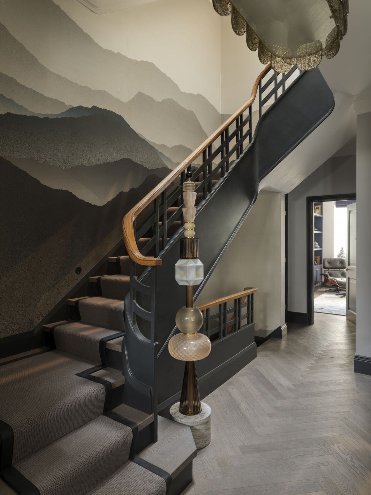 The striking wallpaper defines the entrance foyer (Photo: Richard Gooding)
