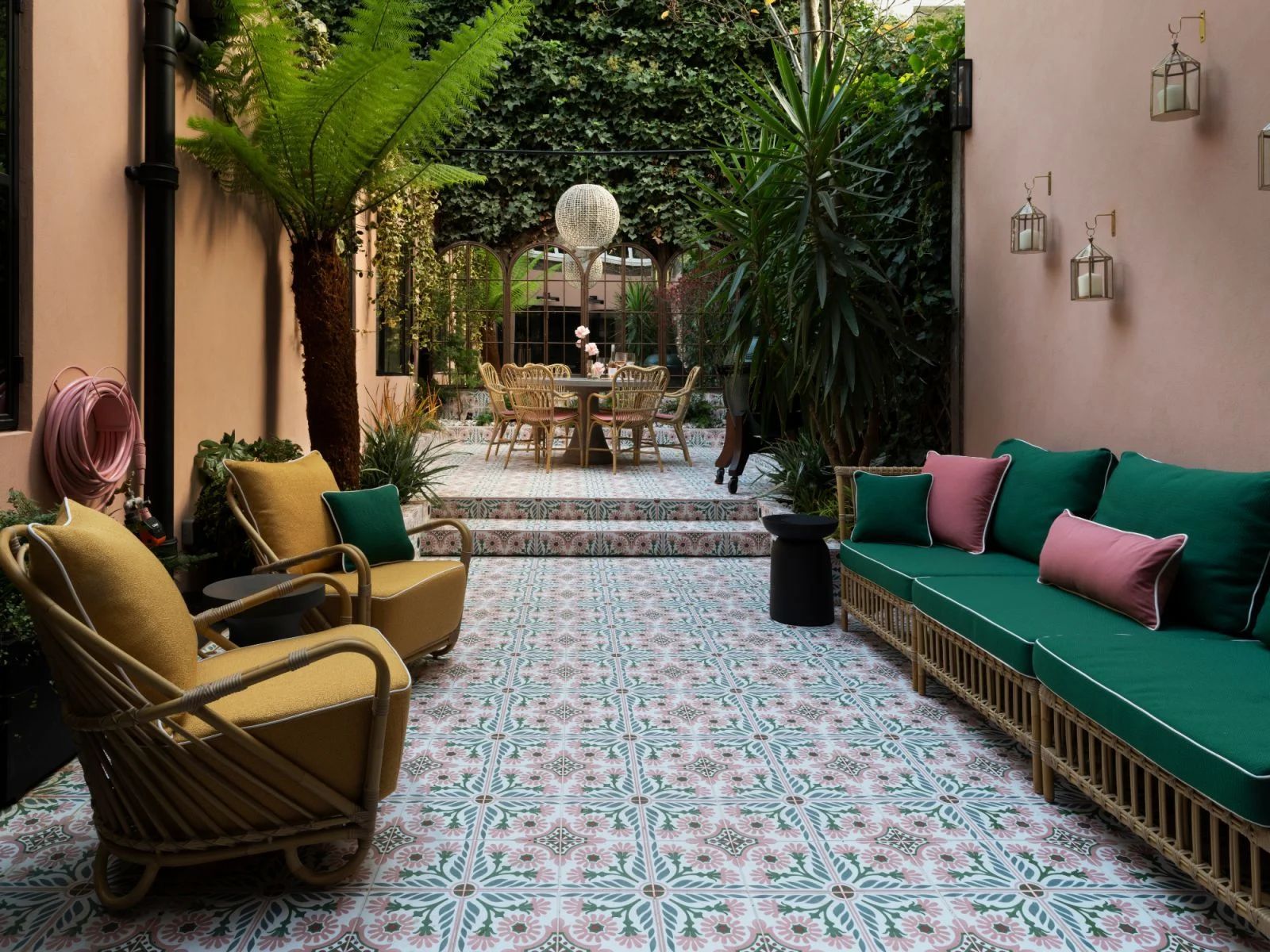 The Moroccan-inspired backyard with patterned tiles and pink plastered walls (Photo: Richard Gooding)