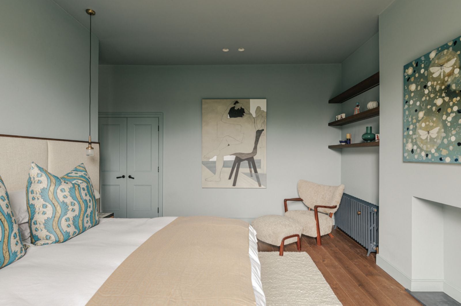 The master bedroom combines neutral tones with calming blues (Photo: Chris Wharton)