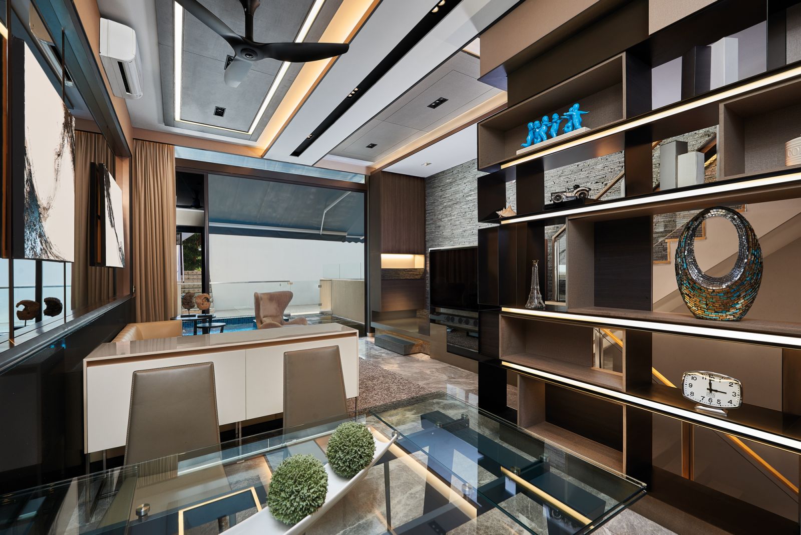 The clean-lined living and dining areas feature an understated sense of glamour