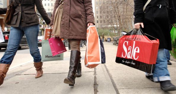 boxing day - 12/26/06 - TORONTO, ONTARIO - Shoppers searched out Boxing Day sales all over the city, including the post Yorkville area. Jessica Gold, 24, (left), Nikki Kozloss, 24 and Danielle Cohen, 24, make their way along Cumberland Avenue with their bags from their morning shopping spree. (Photo by Rick Madonik/Toronto Star via Getty Images)