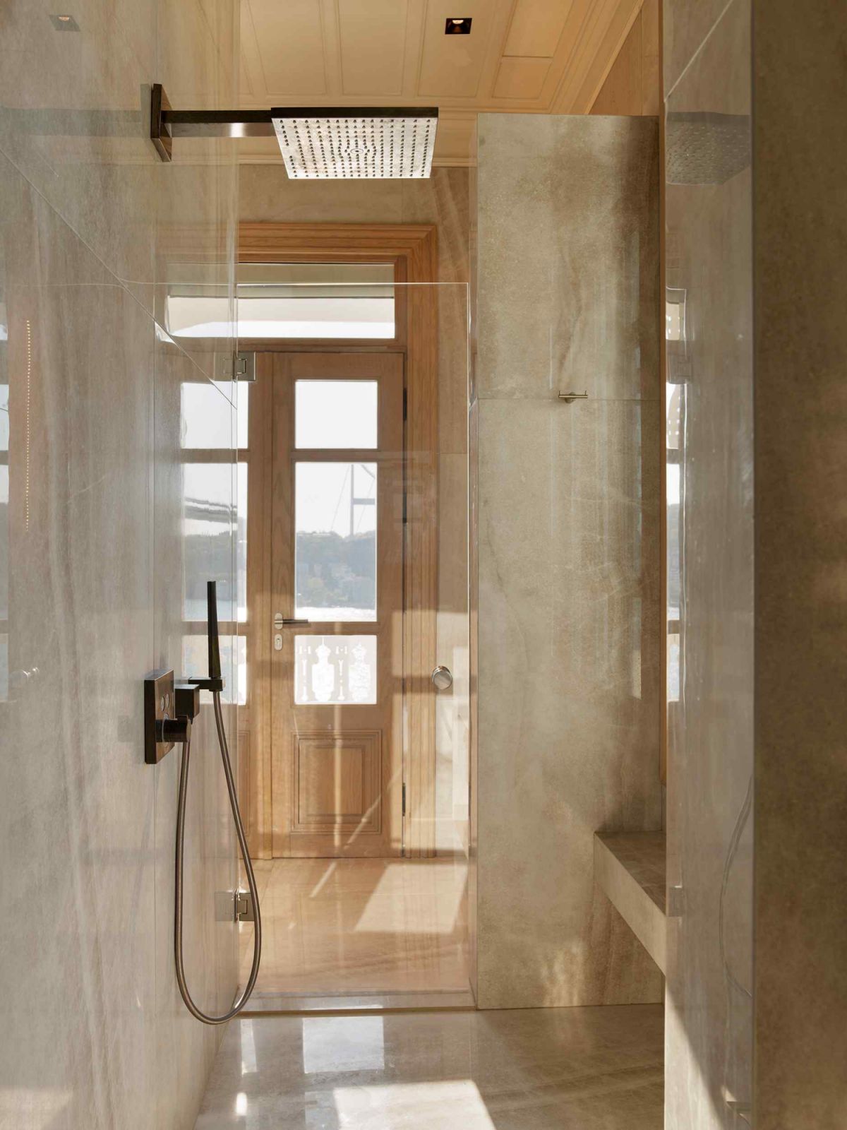 The muted palette inspired by the coastal setting