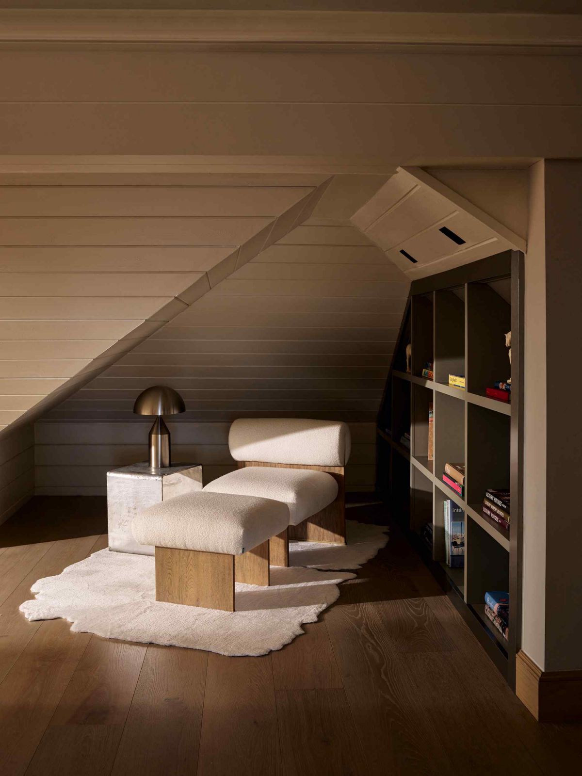 A stylish reading corner in the intimate attic space