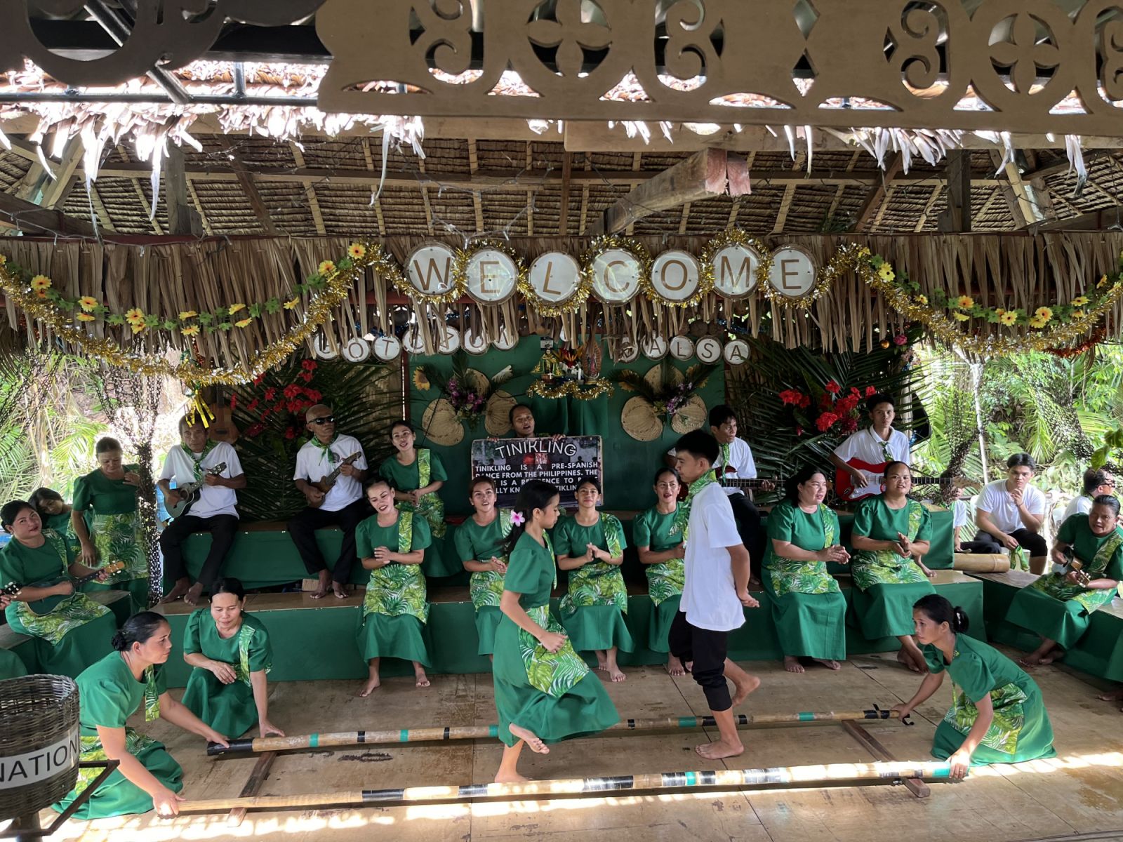 The Loboc Children's Choir performing Tinikling at Loboc River