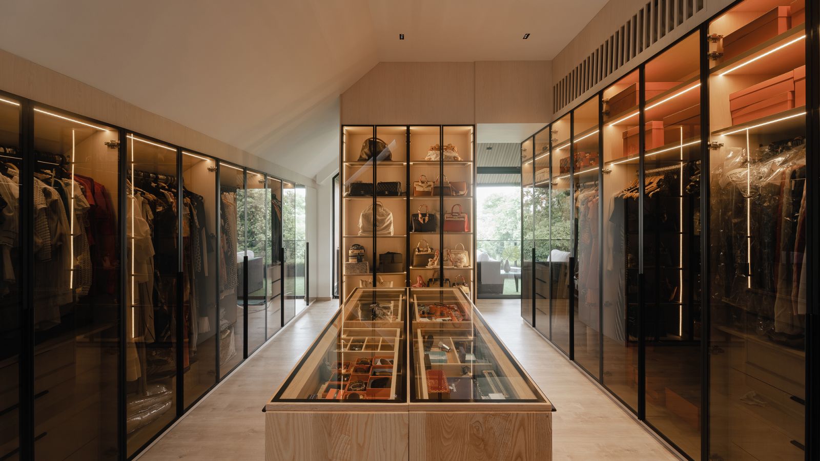 The walk-in wardrobe has his and hers sides as well as access to the balcony