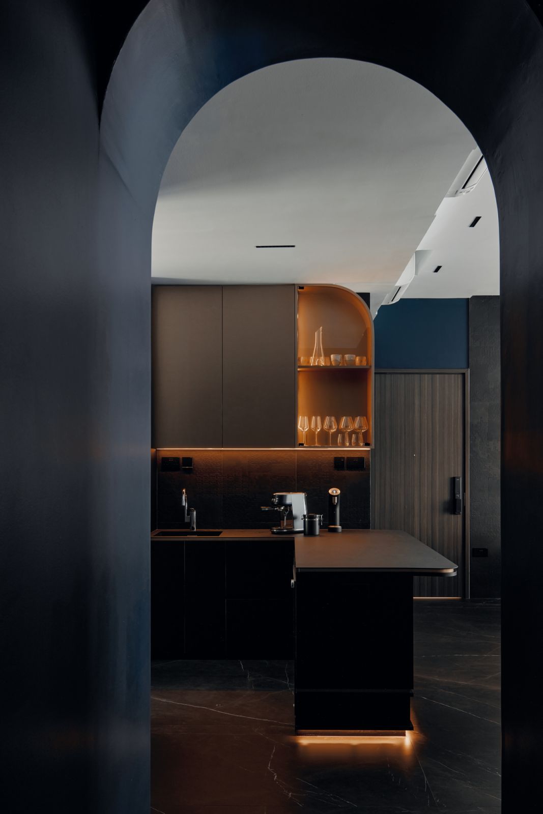 A romantic vignette of the kitchen seen through the archway