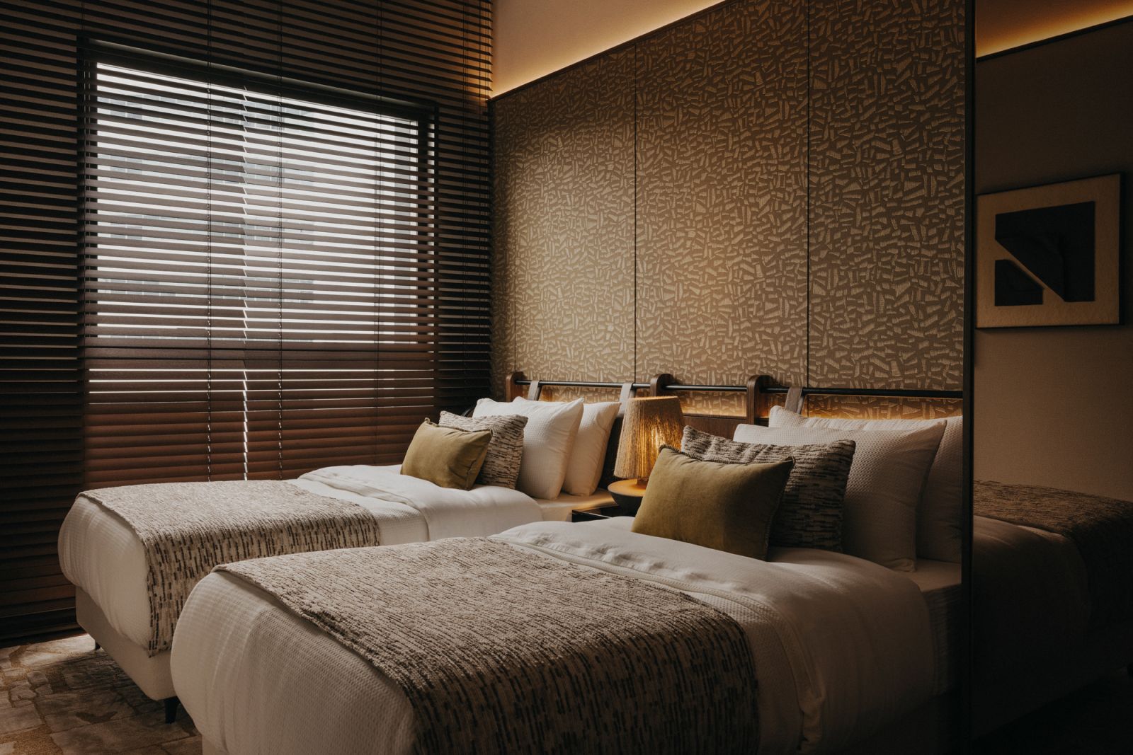 The guest room features a sumptuous colour scheme replete with subtle patterns