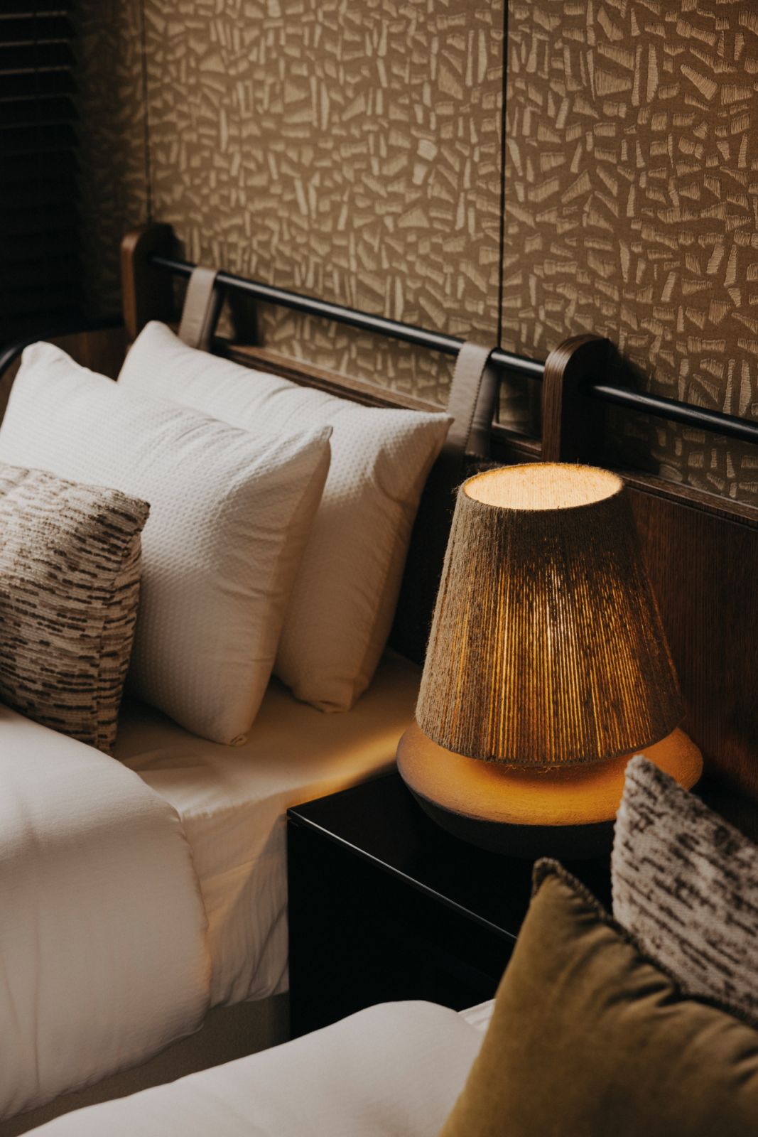A close-up detail of the bedside table in the same bedroom