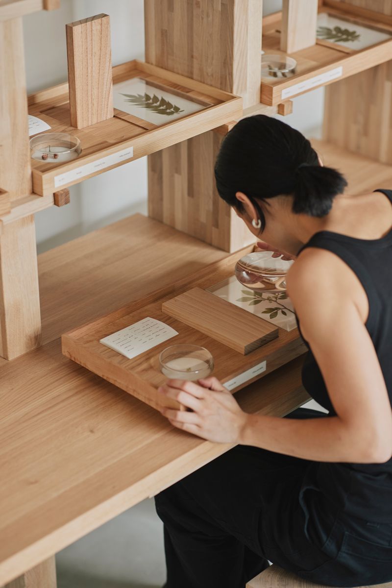 Chan on the installation's work surface