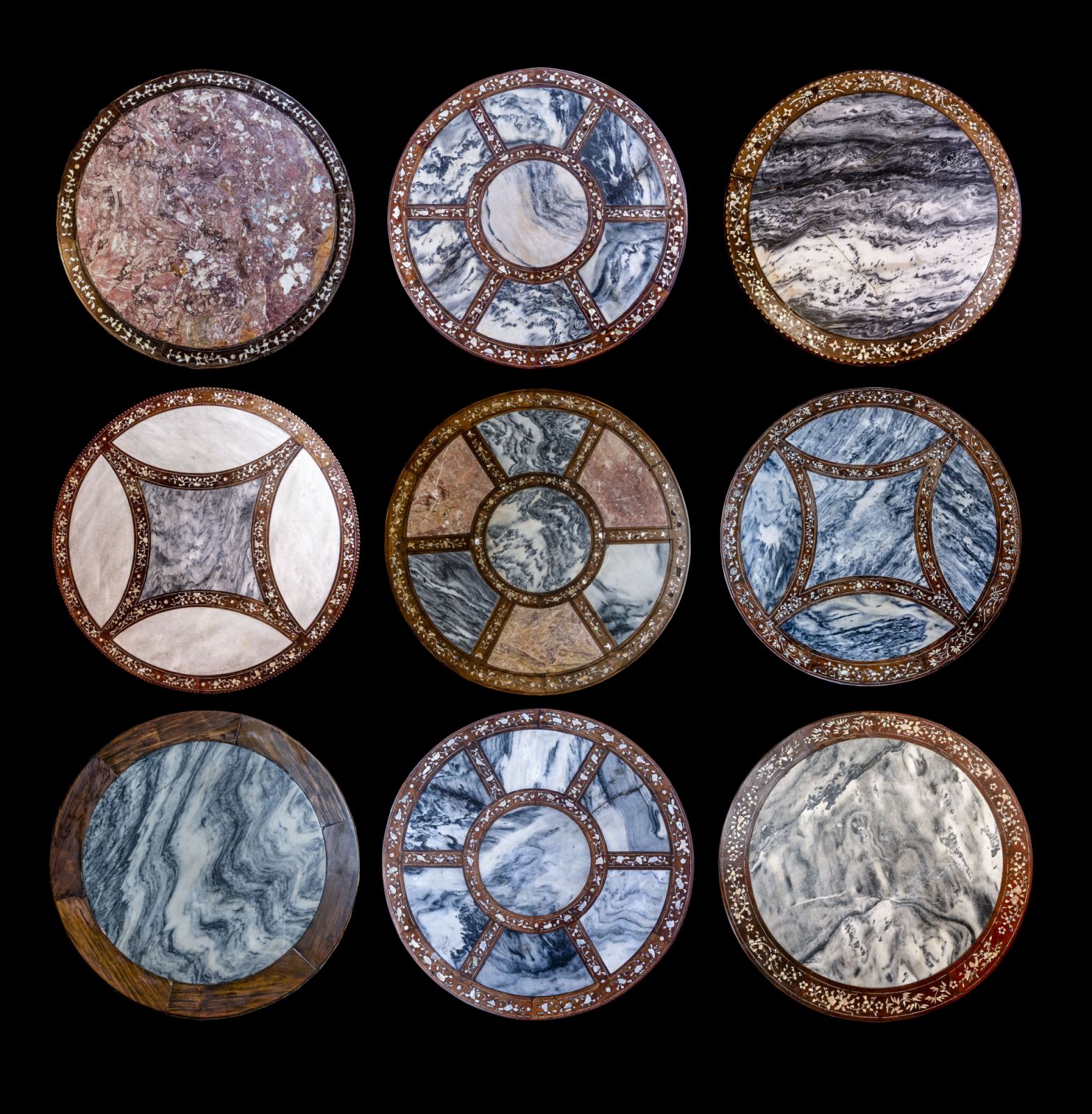A composite of the tabletops of centre pedestal tables found in Ong’s hotels