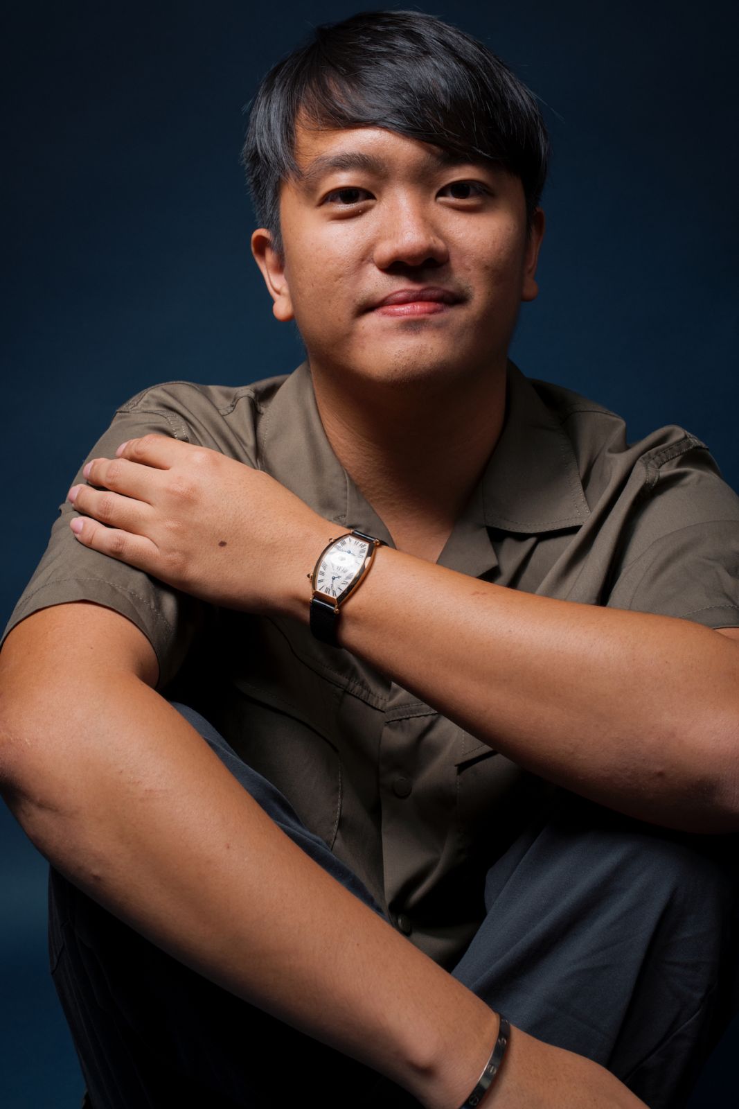 Denson Ng wears his preloved Cartier Tonneau Dual Time